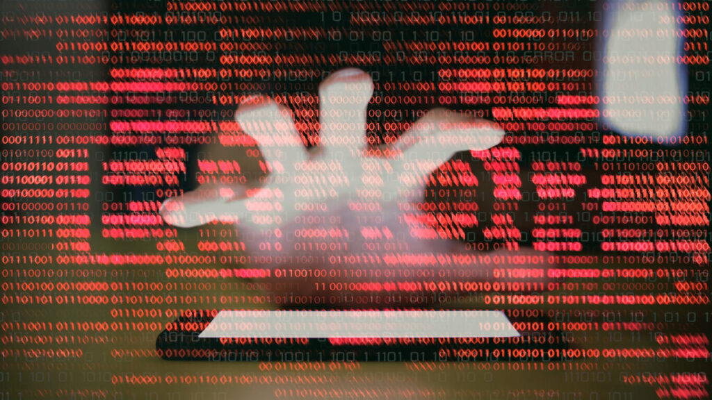 intrusion of privacy. hacker reaching in to smartphone mobile device and scramble the phone. double exposure reaching hand and negative error text made of red binary code